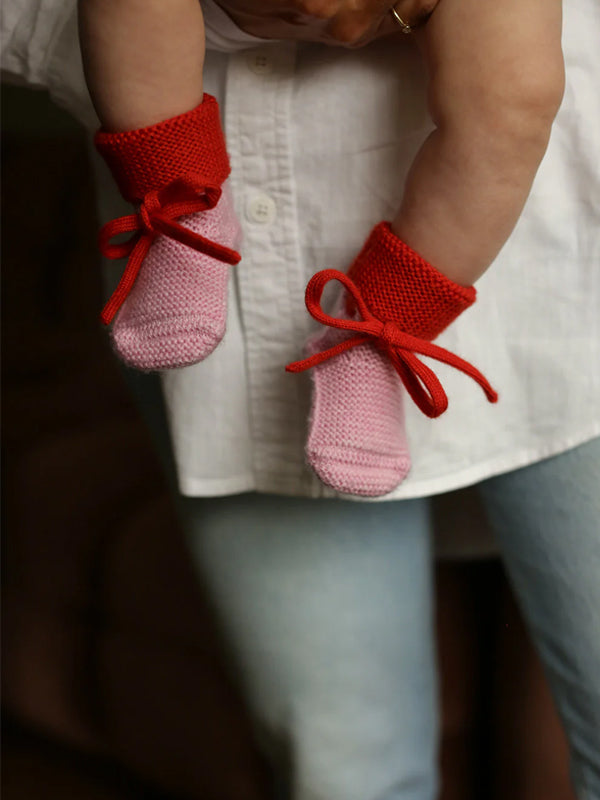 Futter i merino uld fra Hvid Knitware - Cotton candy/Red.