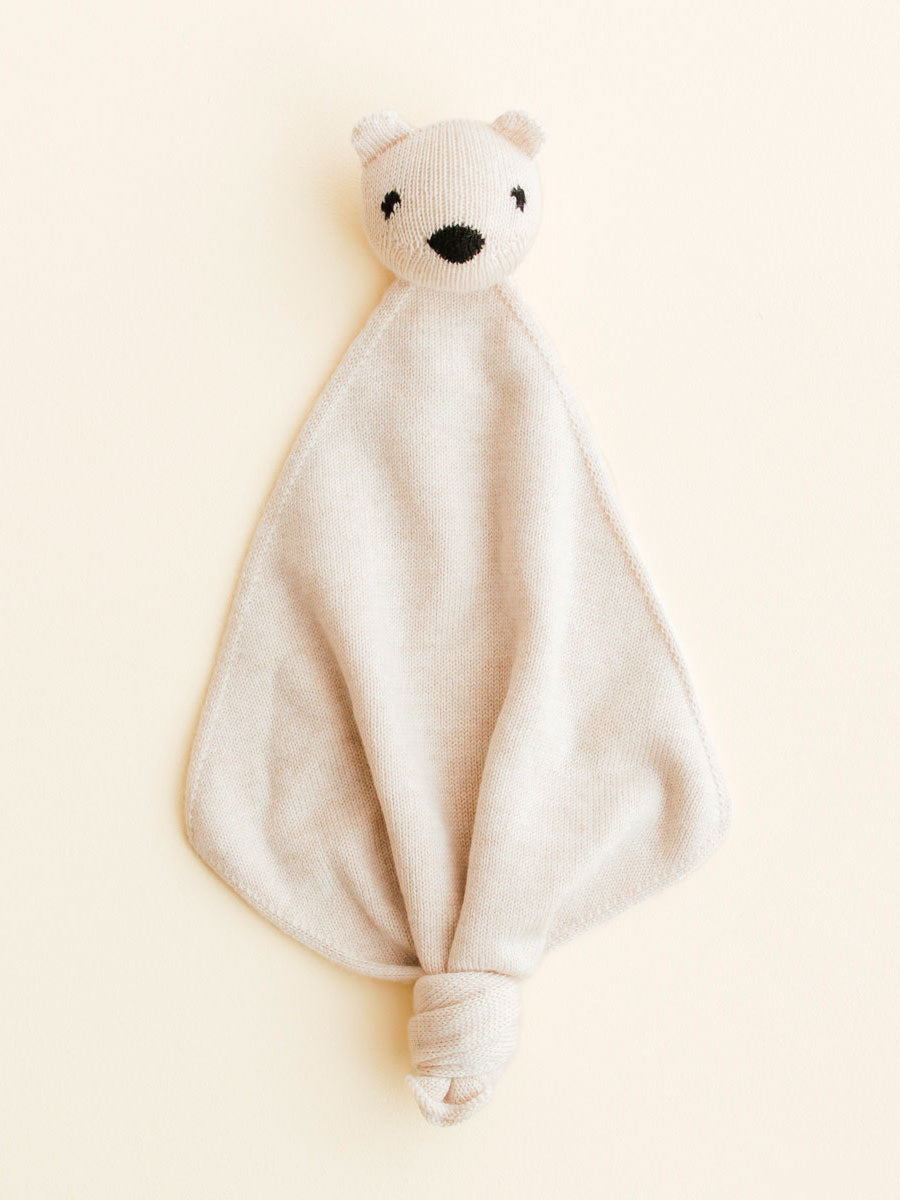 Nusseklud i merino uld fra Hvid Knitware - Cream