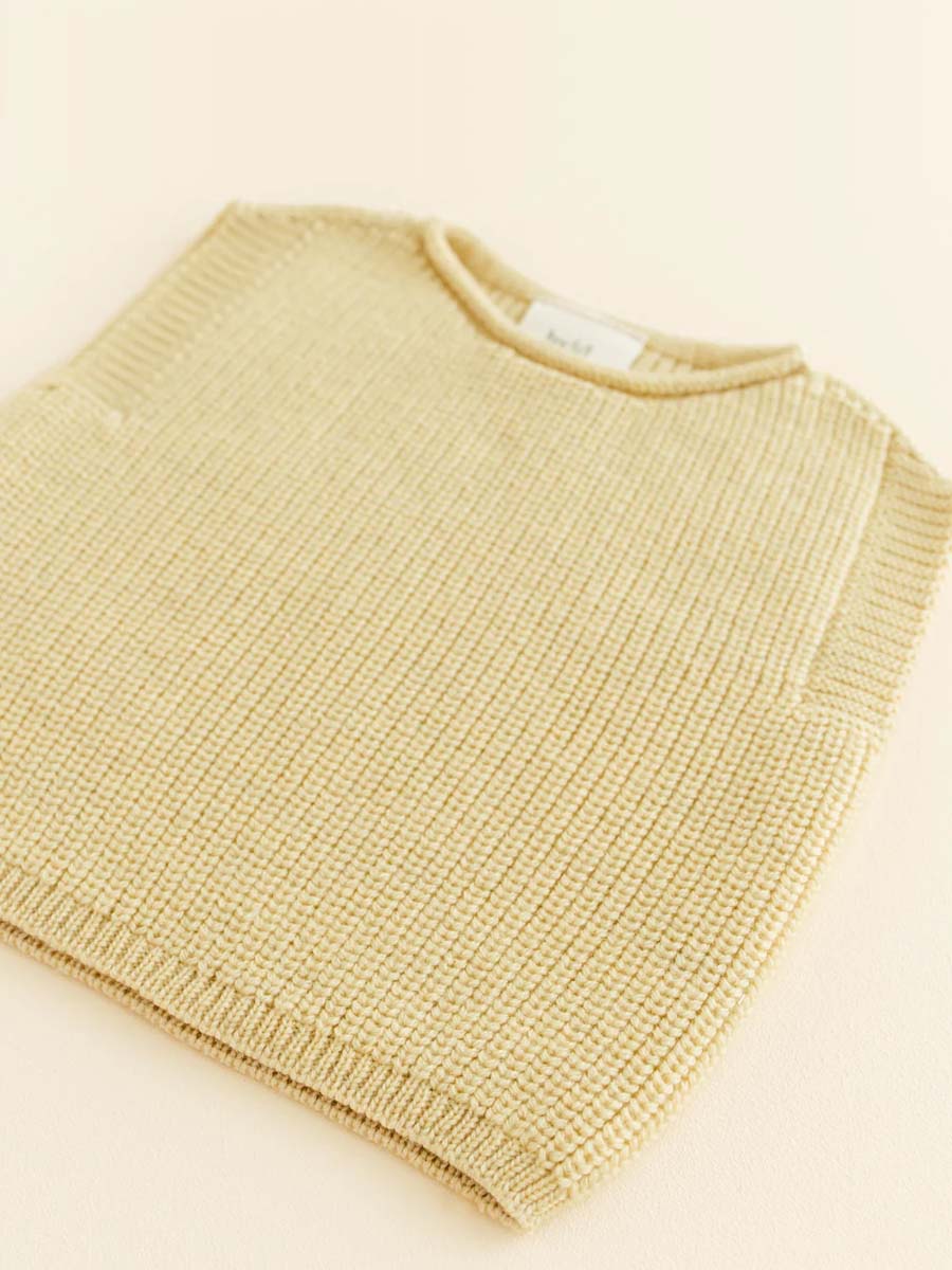 Vest i merino uld fra Hvid Knitware, lys gul.