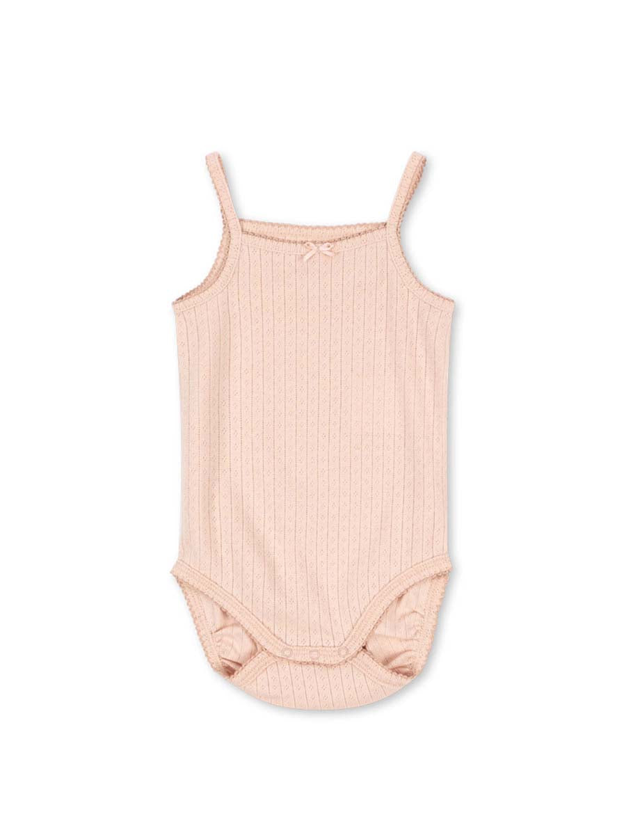 Sød bodystocking uden ærmer og med hulmønster fra danske Konges Sløjd.