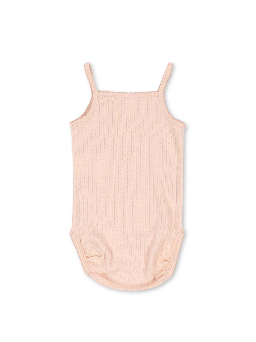 Sød bodystocking uden ærmer og med hulmønster fra danske Konges Sløjd