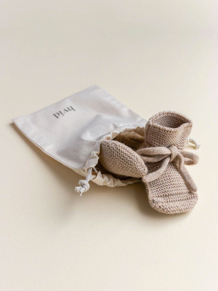 Futter i merino uld fra Hvid Knitware - Sand