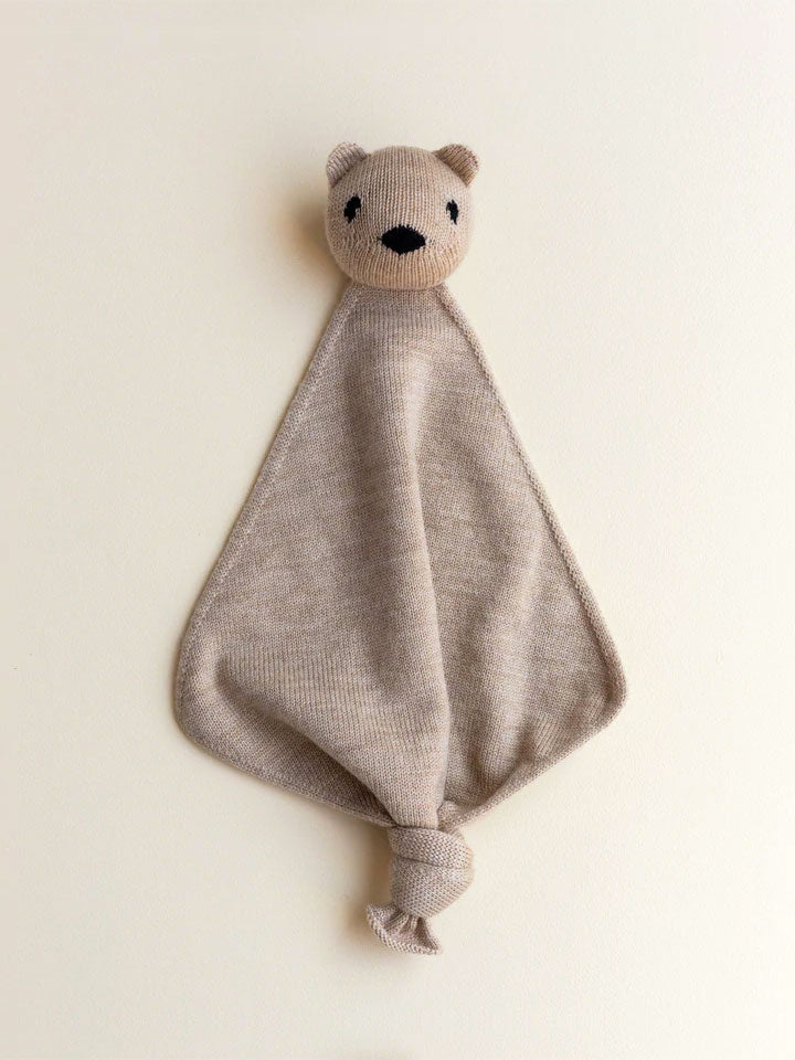 Nusseklud i merino uld fra Hvid Knitware - Sand