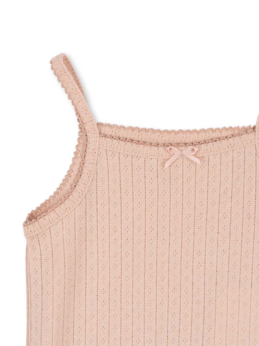 Bodystocking uden ærmer og med hulmønster fra danske Konges Sløjd.