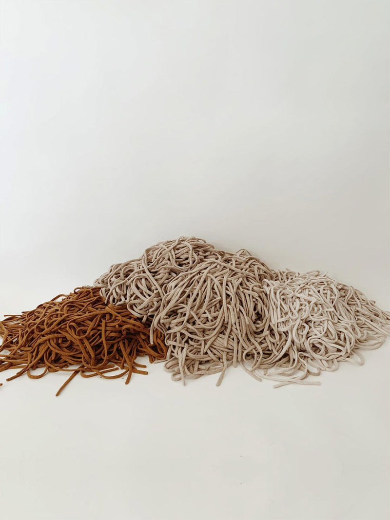 Futter i merino uld fra Hvid Knitware - Sand
