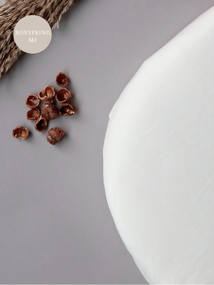 Flødefarvet lagen fra Cocoon Company til Babybay Boxspring mf.