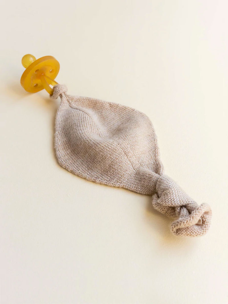 Suttesnor i merino uld fra Hvid Knitware - Sand